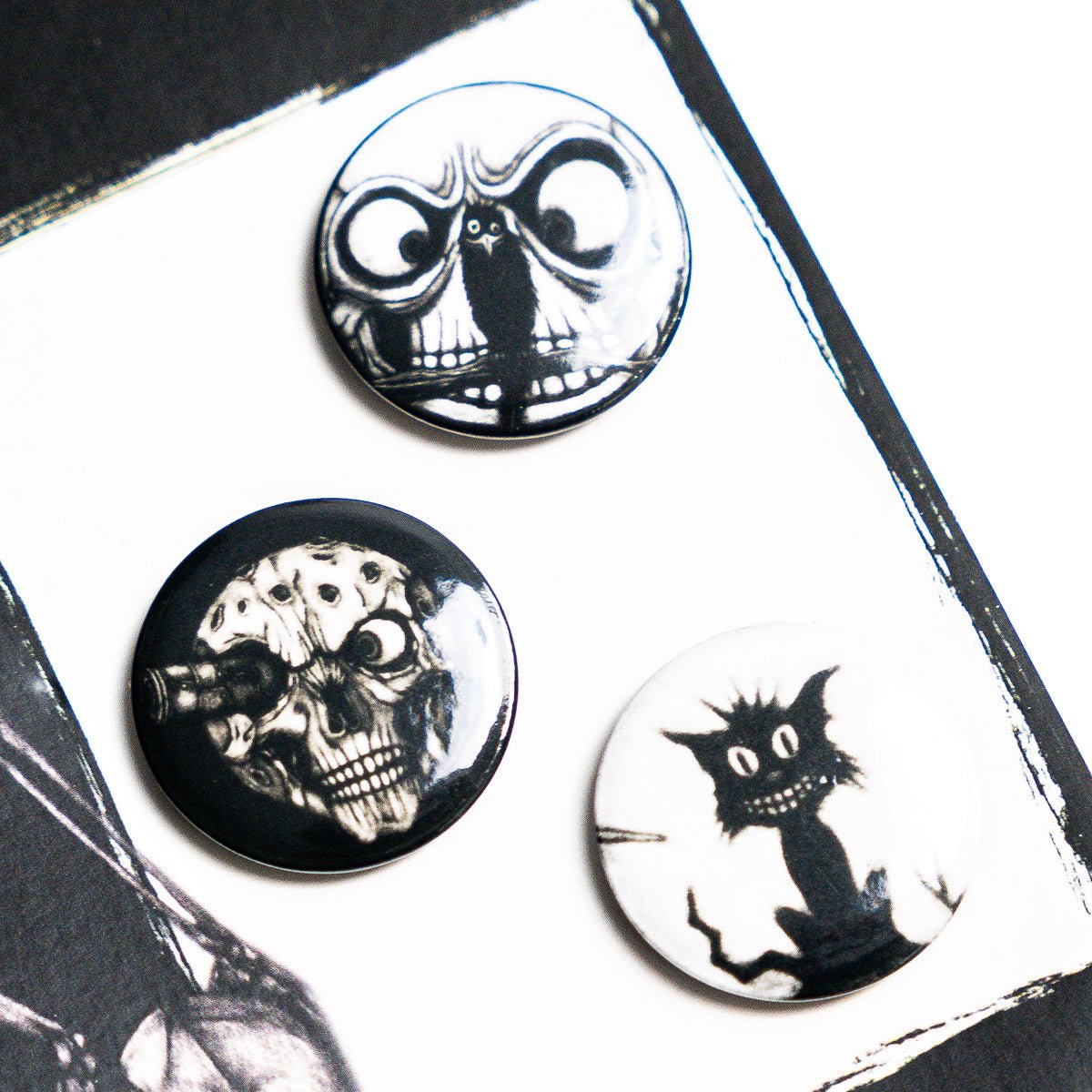 CRIPPLED BLACK PHOENIX "Sceaduhelm" Button Badge Set - Evil Greed